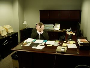 frustrated man at desk
